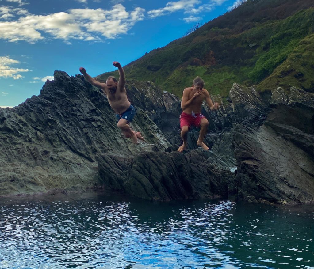 Jumping into the tidal pool at Polperro